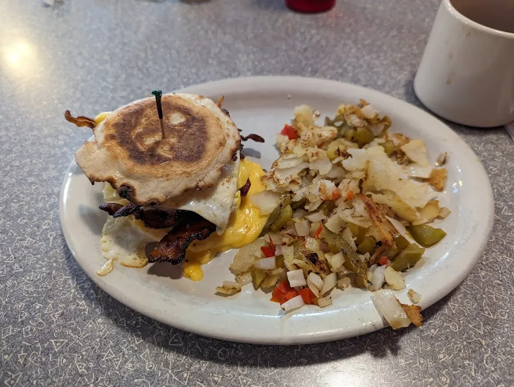 Bacon Egg Cheese on English Muffin and Home Fries